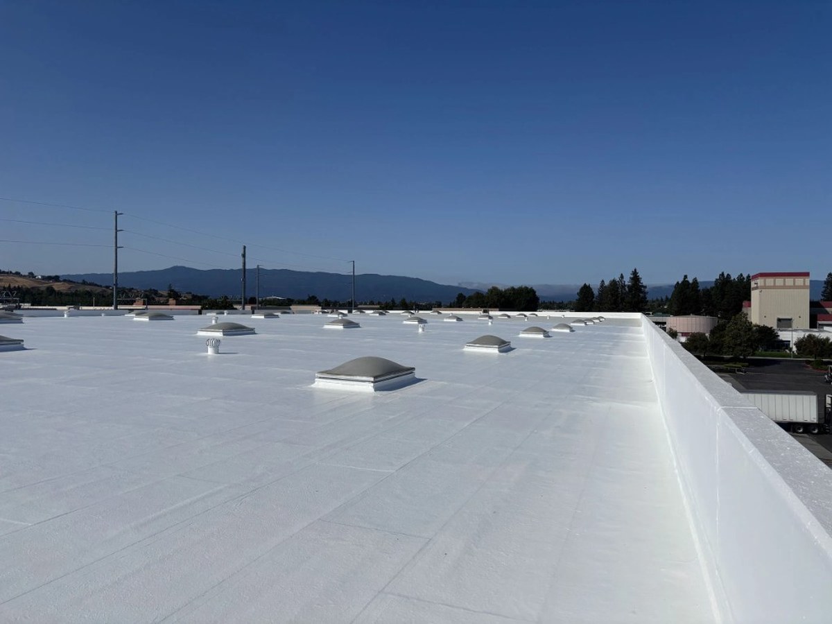 Finished white commercial roof waterproofing system in San Jose