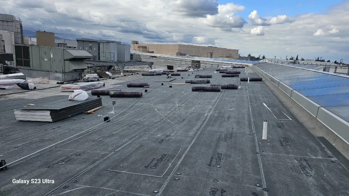 New commercial roof installation with DensDeck cover board in San Jose